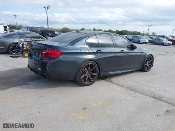 2013 BMW M5 with VIN WBSFV9C59DD096774, listed as a IAAI auction lot 41608286 with 82,601 mi miles. Bid and sale history available at carsss.com. Image 4.