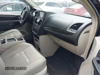2013 Chrysler Town & Country Touring with VIN 2C4RC1BG5DR554662, listed as a IAAI auction lot 41833006 with 143,626 mi miles and . Bid and sale history available at DreamBid. Image 5.