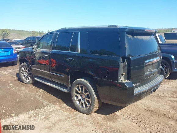 2016 GMC Yukon Denali with VIN 1GKS1CKJ2GR128618, listed as a IAAI auction lot 40009657 with 175,776 mi miles. Bid and sale history available at carsss.com. Image 3.