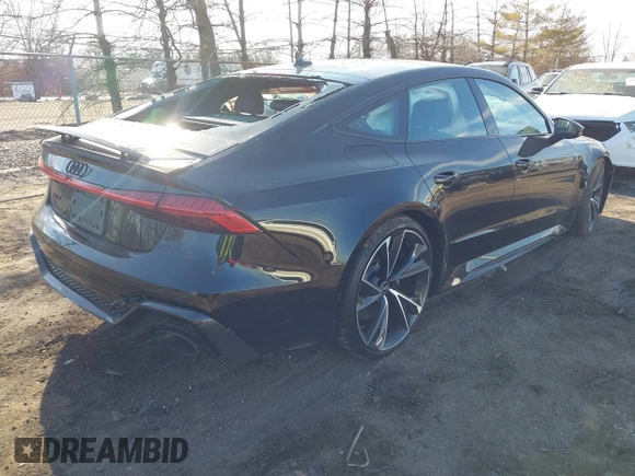 2021 Audi RS 7 z VIN WUAPCBF23MN903930, wystawiony jako IAAI lot #41669778 z przebiegiem 13 175 mil mil oraz . Historia ofert i sprzedaży dostępna na DreamBid. Obrazek 4.