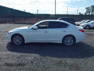 2014 Infiniti Q50 Premium with VIN JN1BV7AR9EM701624, listed as a IAAI auction lot 41711699 with 119,418 mi miles. Bid and sale history available at carsss.com. Image 14.