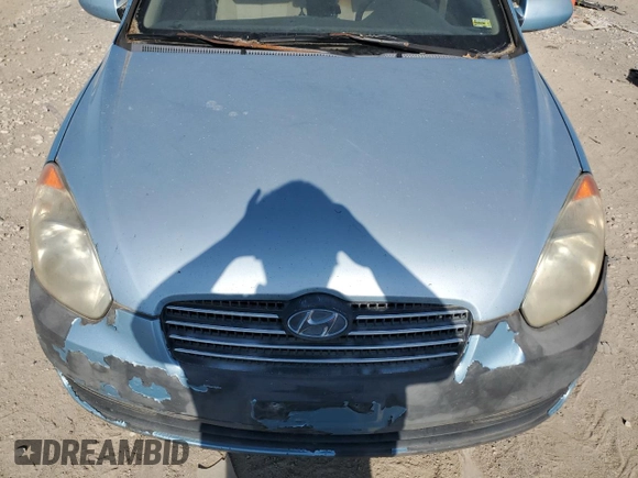 2006 Hyundai Accent GLS z VIN KMHCN46C56U050963, wystawiony jako Copart lot #60979955 z przebiegiem Nie podano mil oraz Czysty tytuł • Clean title. Historia ofert i sprzedaży dostępna na DreamBid. Obrazek 11.