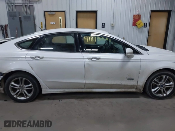 2016 Ford Fusion Titanium with VIN 3FA6P0SU8GR259163, listed as a IAAI auction lot 41812294 with 151,002 mi miles and . Bid and sale history available at DreamBid. Image 13.