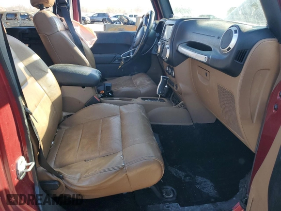2012 Jeep Wrangler Unlimited Rubicon with VIN 1C4HJWFG4CL114089, listed as a Copart auction lot 49436495 with 189,079 mi miles and Salvage title. Bid and sale history available at DreamBid. Image 7.