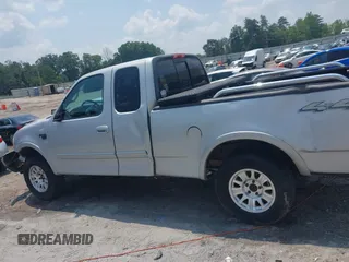 2000 Ford F-150 XL with VIN 1FTRX18L1YNA13975, listed as a IAAI auction lot 42397187 with 235,471 mi miles and . Bid and sale history available at DreamBid. Image 14.