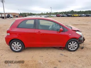 2009 Toyota Yaris with VIN JTDJT903595243068, listed as a IAAI auction lot 41899358 with 310,199 mi miles. Bid and sale history available at carsss.com. Image 13.