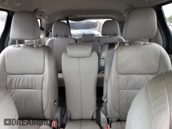 2015 Toyota Sienna XLE with VIN 5TDYK3DC0FS592251, listed as a Copart auction lot 60126165 with 118,925 mi miles and Salvage title. Bid and sale history available at DreamBid. Image 10.