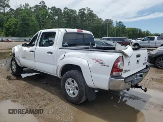 2010 Toyota Tacoma PreRunner with VIN 3TMJU4GN8AM102663, listed as a Copart auction lot 57782665 with 196,620 mi miles and Salvage title. Bid and sale history available at DreamBid. Image 2.