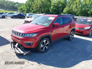 2017 Jeep Compass Latitude with VIN 3C4NJDBBXHT666614, listed as a IAAI auction lot 42318108 with 79,413 mi miles and . Bid and sale history available at DreamBid. Image 17.