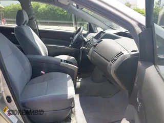 2005 Toyota Prius z VIN JTDKB20UX57051568, wystawiony jako IAAI lot #42318318 z przebiegiem 138 487 mil mil oraz . Historia ofert i sprzedaży dostępna na DreamBid. Obrazek 5.