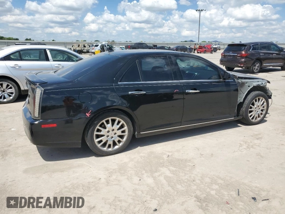 2008 Cadillac STS RWD z VIN 1G6DK67V980143995, wystawiony jako Copart lot #56365325 z przebiegiem 128 787 mil mil oraz Szkoda całkowita • Salvage title. Historia ofert i sprzedaży dostępna na DreamBid. Obrazek 3.