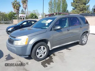 2005 Chevrolet Equinox LS with VIN 2CNDL13F656160747, listed as a IAAI auction lot 42054793 with 156,479 mi miles. Bid and sale history available at carsss.com. Image 2.