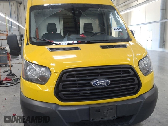 2019 Ford Transit z VIN 1FTYR3XM3KKA38669, wystawiony jako IAAI lot #42619599 z przebiegiem 135 929 mil mil oraz . Historia ofert i sprzedaży dostępna na DreamBid. Obrazek 18.