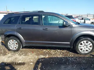 2017 Dodge Journey SE with VIN 3C4PDCAB0HT701222, listed as a IAAI auction lot 41770114 with 133,367 mi miles and . Bid and sale history available at DreamBid. Image 14.