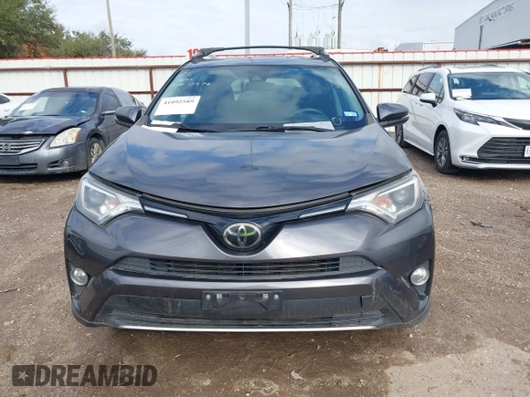 2018 Toyota RAV4 XLE with VIN 2T3WFREV4JW417555, listed as a IAAI auction lot 41092589 with 93,788 mi miles and . Bid and sale history available at DreamBid. Image 13.