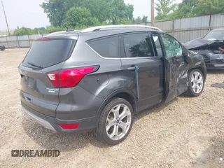 2019 Ford Escape Titanium with VIN 1FMCU0J97KUA34281, listed as a IAAI auction lot 42409579 with 55,400 mi miles and . Bid and sale history available at DreamBid. Image 4.