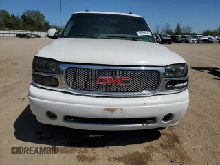 2003 GMC Yukon Denali z VIN 1GKEK63U53J210632, wystawiony jako Copart lot #56098925 z przebiegiem 258 313 mil mil oraz Szkoda całkowita • Salvage title. Historia ofert i sprzedaży dostępna na DreamBid. Obrazek 5.