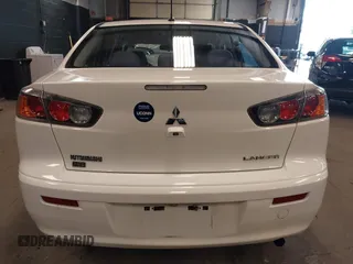 2014 Mitsubishi Lancer SE with VIN JA32V2FW1EU018927, listed as a IAAI auction lot 42059116 with 148,874 mi miles and . Bid and sale history available at carsss.com. Image 16.