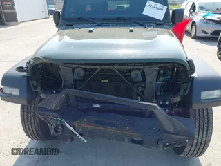2023 Jeep Wrangler Willys with VIN 1C4HJXDG7PW646627, listed as a IAAI auction lot 42469601 with 50,178 mi miles and . Bid and sale history available at DreamBid. Image 6.