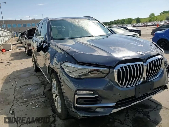 2020 BMW X5 xDrive40i with VIN 5UXCR6C06LLL75359, listed as a Copart auction lot 60897885 with 66,631 mi miles and Salvage title. Bid and sale history available at DreamBid. Image 13.
