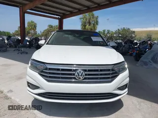 2019 Volkswagen Jetta SEL Premium z VIN 3VWGB7BU6KM168451, wystawiony jako IAAI lot #42090183 z przebiegiem 75 851 mil mil oraz . Historia ofert i sprzedaży dostępna na DreamBid. Obrazek 11.