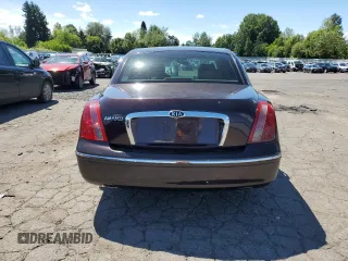 2008 Kia Amanti z VIN KNALD125085164330, wystawiony jako Copart lot #56377374 z przebiegiem 156 972 mil mil oraz Szkody całkowita. Historia ofert i sprzedaży dostępna na DreamBid. Obrazek 6.
