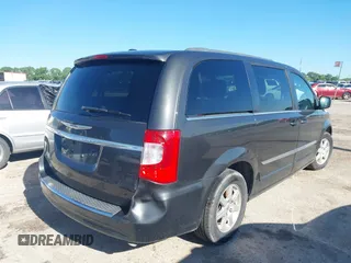 2012 Chrysler Town & Country Touring with VIN 2C4RC1BG1CR401016, listed as a IAAI auction lot 42086972 with 145,373 mi miles. Bid and sale history available at carsss.com. Image 4.