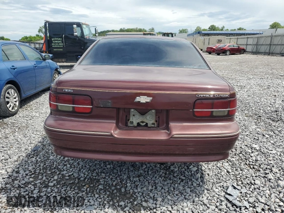 1991 Chevrolet Caprice z VIN 1G1BN53E9MW187619, wystawiony jako Copart lot #55291845 z przebiegiem 1 433 530 mil mil oraz Szkoda całkowita • Salvage title. Historia ofert i sprzedaży dostępna na DreamBid. Obrazek 6.