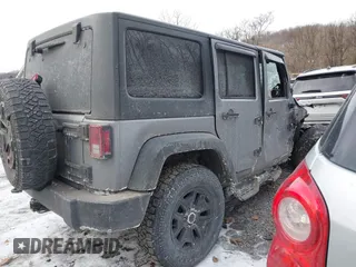 2014 Jeep Wrangler Unlimited Sport with VIN 1C4HJWDG1EL302087, listed as a IAAI auction lot 41420740 with 152,096 mi miles. Bid and sale history available at carsss.com. Image 4.