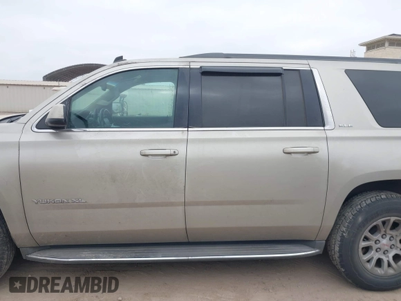 2015 GMC Yukon XL SLE z VIN 1GKS1GKC1FR155056, wystawiony jako IAAI lot #41517607 z przebiegiem 174 634 mil mil oraz . Historia ofert i sprzedaży dostępna na DreamBid. Obrazek 14.
