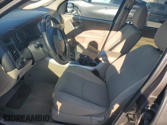 2006 Mazda Tribute S with VIN 4F2YZ04106KM28191, listed as a Copart auction lot 83150994 with 126,536 mi miles and Clean Title. Bid and sale history available at DreamBid. Image 7.