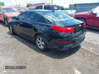2014 Kia Optima LX with VIN 5XXGM4A72EG285974, listed as a IAAI auction lot 42667984 with 232,863 mi miles and . Bid and sale history available at DreamBid. Image 3.
