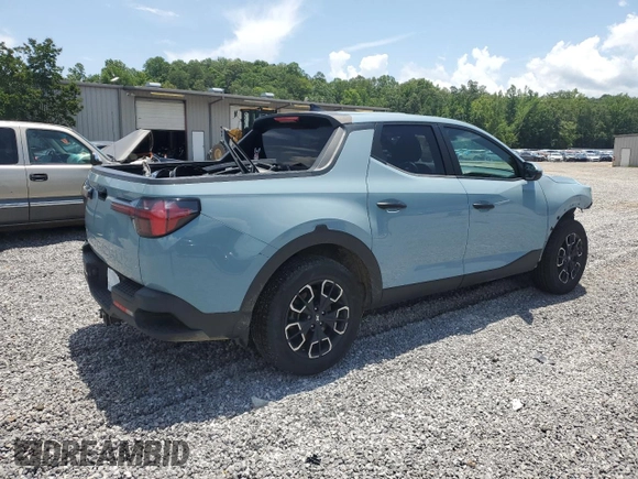 2022 Hyundai Santa Cruz SEL with VIN 5NTJB4AEXNH018789, listed as a Copart auction lot 61260335 with 74,992 mi miles and Salvage title. Bid and sale history available at DreamBid. Image 3.
