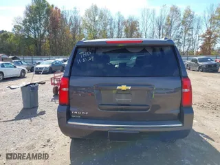 2015 Chevrolet Tahoe LTZ with VIN 1GNSKCKC3FR640615, listed as a IAAI auction lot 40843080 with 142,445 mi miles. Bid and sale history available at carsss.com. Image 16.