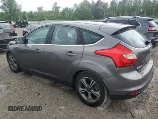 2014 Ford Focus Titanium with VIN 1FADP3N20EL329415, listed as a Copart auction lot 60881115 with 97,382 mi miles and Salvage title. Bid and sale history available at DreamBid. Image 2.