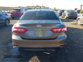 2020 Toyota Camry LE with VIN 4T1C11AKXLU884764, listed as a IAAI auction lot 40821088 with 111,631 mi miles. Bid and sale history available at carsss.com. Image 16.