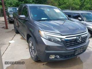 2019 Honda Ridgeline RTL z VIN 5FPYK3F53KB044524, wystawiony jako IAAI lot #42081657 z przebiegiem 102 023 mil mil oraz . Historia ofert i sprzedaży dostępna na DreamBid. Obrazek 1.