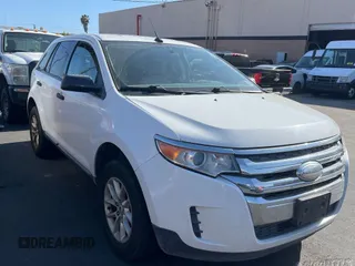 2014 Ford Edge SE z VIN 2FMDK3GC3EBA18409, wystawiony jako IAAI lot #42328882 z przebiegiem 156 522 mil mil oraz . Historia ofert i sprzedaży dostępna na DreamBid. Obrazek 1.