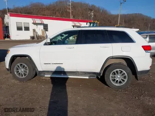 2018 Jeep Grand Cherokee Laredo E with VIN 1C4RJFAG0JC298441, listed as a IAAI auction lot 41748555 with 144,606 mi miles. Bid and sale history available at carsss.com. Image 14.