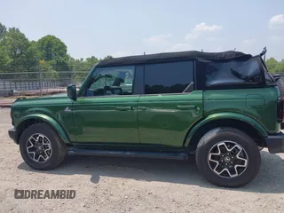2024 Ford Bronco Outer Banks z VIN 1FMEE8BPXRLA06492, wystawiony jako IAAI lot #42365356 z przebiegiem 17 565 mil mil oraz . Historia ofert i sprzedaży dostępna na DreamBid. Obrazek 14.