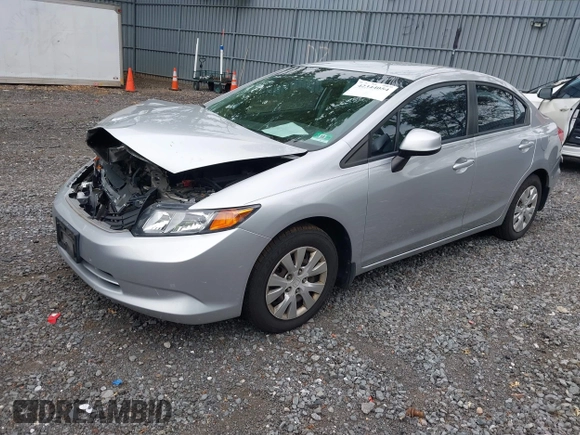 2012 Honda Civic LX z VIN 19XFB2F57CE013066, wystawiony jako IAAI lot #42344054 z przebiegiem 185 986 mil mil oraz . Historia ofert i sprzedaży dostępna na DreamBid. Obrazek 2.