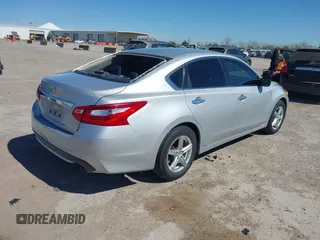 2016 Nissan Altima SR with VIN 1N4AL3AP3GC214309, listed as a IAAI auction lot 41863450 with 114,302 mi miles and . Bid and sale history available at carsss.com. Image 4.