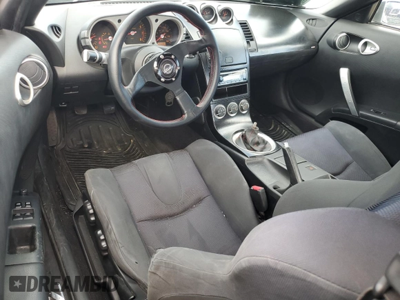 2005 Nissan 350Z with VIN JN1AZ34D55M609063, listed as a Copart auction lot 76796544 with 114,080 mi miles and Salvage Title. Bid and sale history available at DreamBid. Image 8.