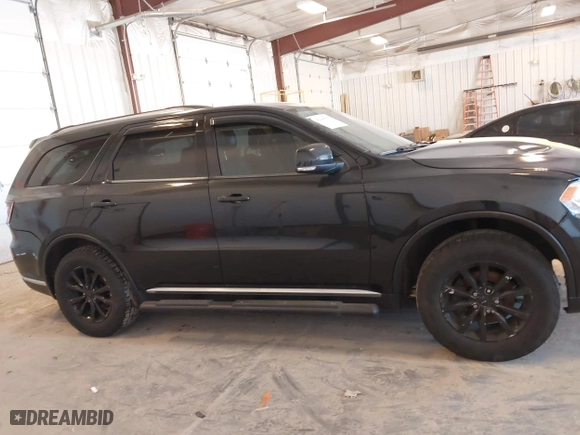 2014 Dodge Durango Limited with VIN 1C4RDJDG3EC585803, listed as a IAAI auction lot 42049378 with 180,722 mi miles. Bid and sale history available at carsss.com. Image 13.