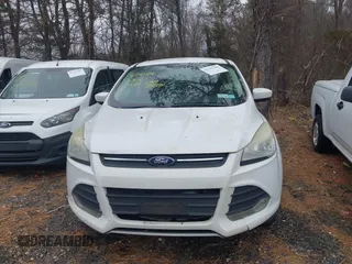 2013 Ford Escape SE with VIN 1FMCU9GX0DUD93680, listed as a IAAI auction lot 41792386 with 262,671 mi miles and . Bid and sale history available at DreamBid. Image 6.