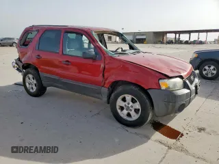 2006 Ford Escape XLT with VIN 1FMYU03136KD25536, listed as a Copart auction lot 56892805 with 187,216 mi miles and Salvage title. Bid and sale history available at DreamBid. Image 4.