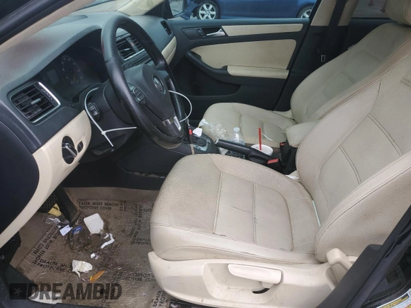 2011 Volkswagen Jetta SE with VIN 3VWDZ7AJXBM318518, listed as a Copart auction lot 50718595 with 164,353 mi miles and Salvage title. Bid and sale history available at DreamBid. Image 7.