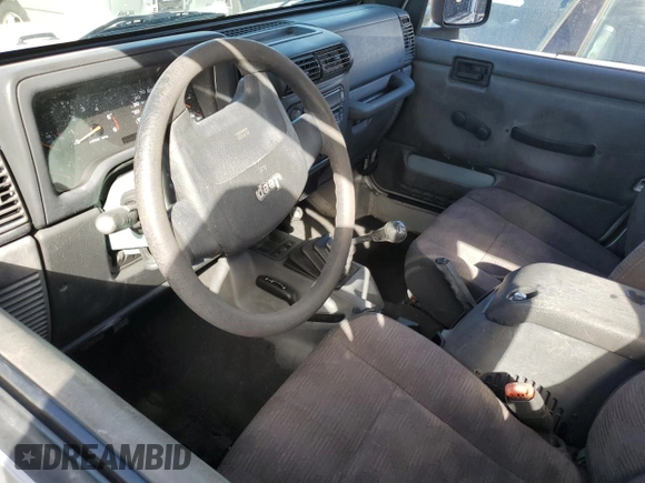 2004 Jeep Wrangler Sport with VIN 1J4FA49SX4P776775, listed as a Copart auction lot 74946824 with Not Provided miles and Salvage Title. Bid and sale history available at carsss.com. Image 8.