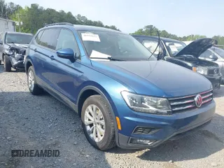 2018 Volkswagen Tiguan S with VIN 3VV0B7AXXJM018455, listed as a IAAI auction lot 41979115 with 92,104 mi miles and . Bid and sale history available at DreamBid. Image 1.