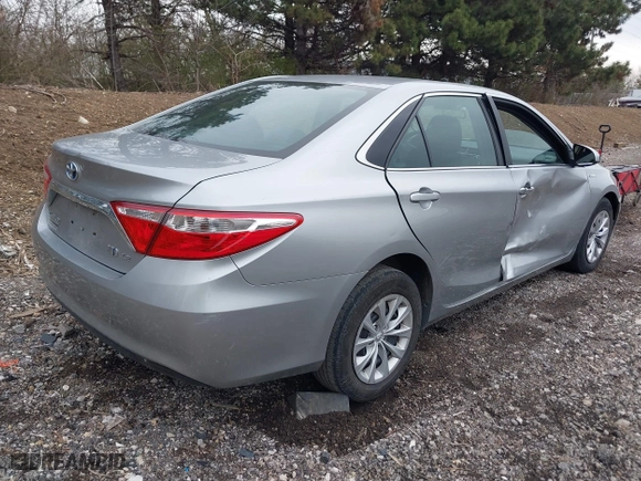2015 Toyota Camry Hybrid LE with VIN 4T1BD1FK9FU161942, listed as a IAAI auction lot 41880622 with 216,632 mi miles. Bid and sale history available at carsss.com. Image 4.